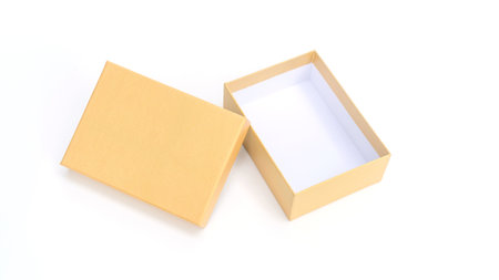Golden gift box on a white background.の写真素材