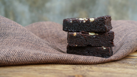Brownies cake on a wooden table.の写真素材