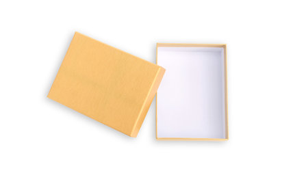 Golden gift box on a white background.の写真素材
