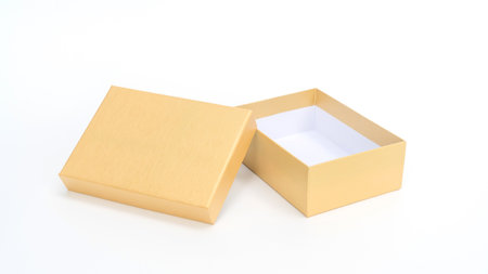 Golden gift box on a white background.の写真素材