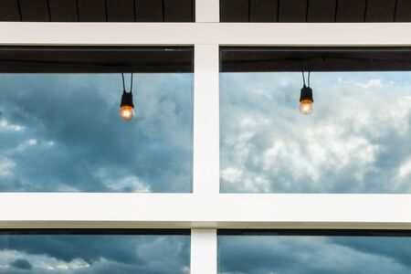 Reflection of the sky in glass of windowの写真素材