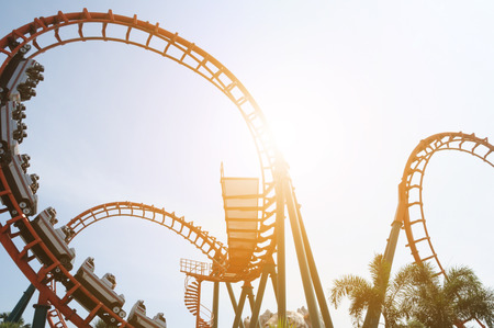 blurred Roller coaster ride in amusement park at eveningのeditorial素材
