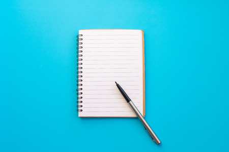 Notebook and equipment back to school on color background.の写真素材