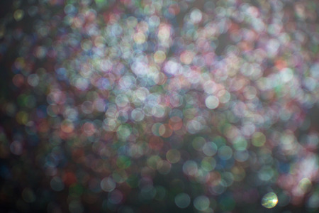 blur of glitter on black background.