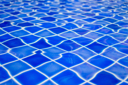 beautiful of blue water at swimming pool, sunny day and soft focus.の写真素材