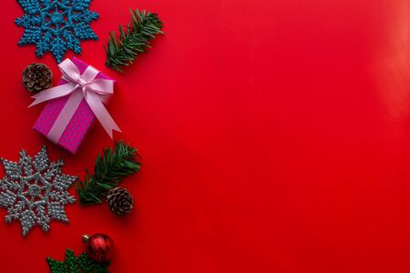 Flat lay of Christmas composition for background on red background. Christmas, winter, new year concept. copy space and soft focus.の写真素材