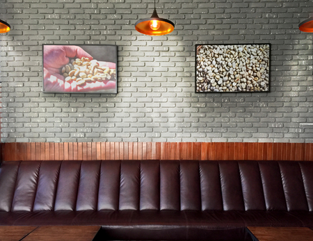 Couch, Picture Frame and Brick Wallの写真素材