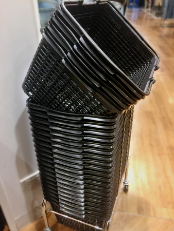Stacked Black Shopping Basketの写真素材