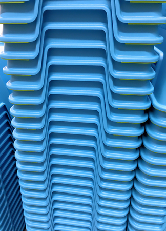Stacked Blue Plastic Chairsの写真素材