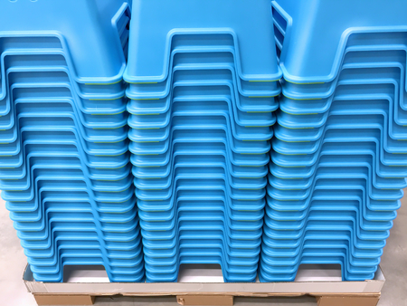 Stacked Blue Plastic Chairsの写真素材