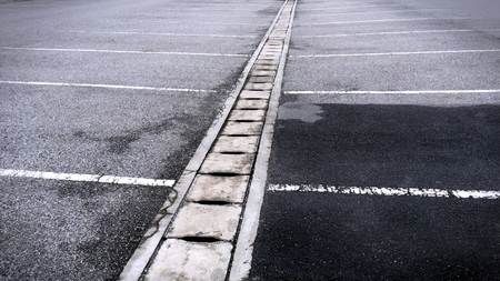 Vacant Asphalt Outdoor Parking Lot After Rainingの写真素材