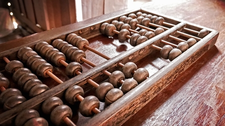 Perspective Vintage Old Wooden Abacus for Counting and Calculationの写真素材