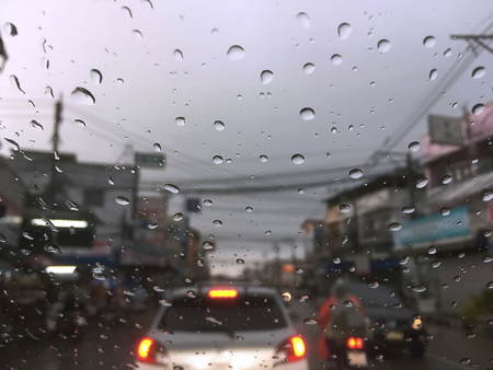 Wind Screen Blurry View of Traffic Jammed in Rainy Seasonの写真素材