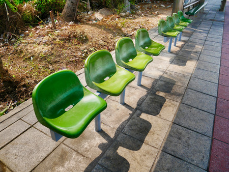 Green Waiting Seats at the Bus Stopの写真素材