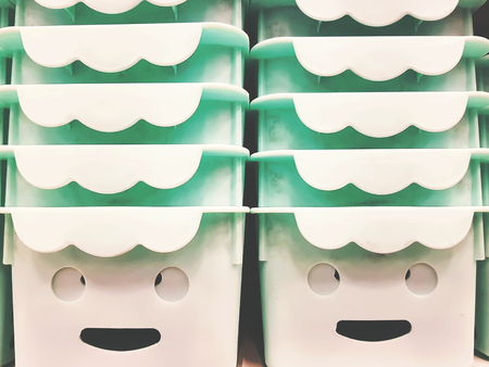 Funny Face Stacked Plastic Traysの写真素材