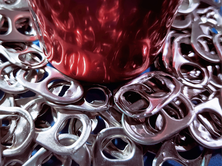Bottom Part of Red Beverage Can on Pile of Tabs