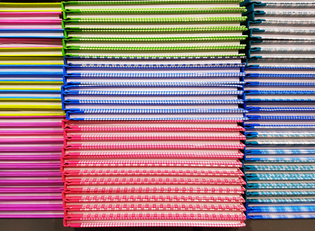 Full Frame Front View of Colorful Hard Covered Notebook Stacks