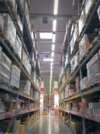 Blur Background of Goods on Shelves at Storage Warehouseの写真素材
