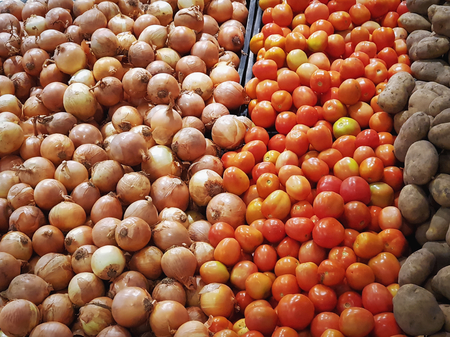 Full Frame Background of Colorful Onions, Tomatoes and Potatoesの写真素材
