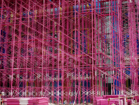 Full Frame Background of Pink Scaffolding at Construction Siteの写真素材