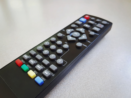 Close-up Black Remote Controller for Digital TV with Selective Focus