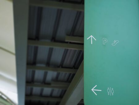Directional Signs and Symbols of Parking Lot, Escalator and Toiletの写真素材
