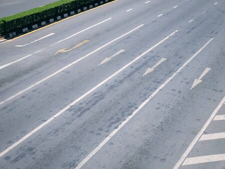 High Angle View of Traffic Arrows of Go Straight and Turn Right on Multiple Lanes