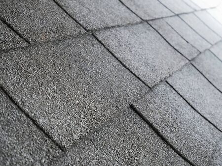 Perspective Gray Tiled Roof with Selective Focusの写真素材