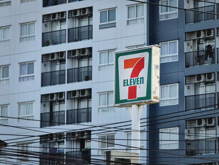 Muang, Samut Prakarn / Thailand - April 4, 2020: 7-Eleven Sign Board Against Building Background