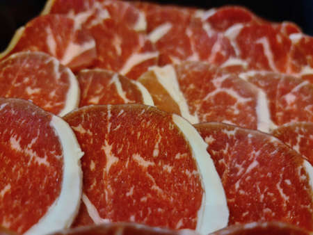 Close-up Thin Red Sliced Beef for Barbecueの写真素材
