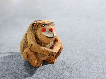 Close-up Happy Smiling Coconut Monkey Doll Looking Awayの写真素材