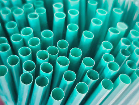 Bunch of Green Drinking Straws Backgroundの写真素材