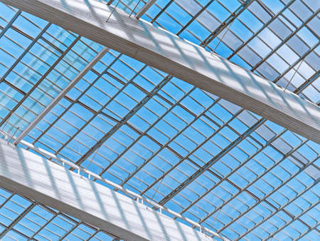 Low Angle View of Modern Structure Against Blue Skyの写真素材