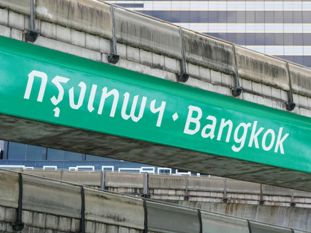 White Texts of Bangkok Words on Green Label in Both Thai and English Laguages
