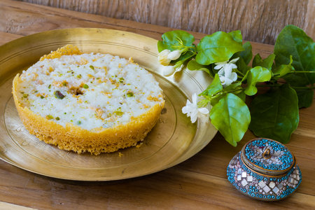 Ghewar or ghevar is a traditional sweet of rajasthan. It is made of milk, flour, ghee and sugar. Dry...