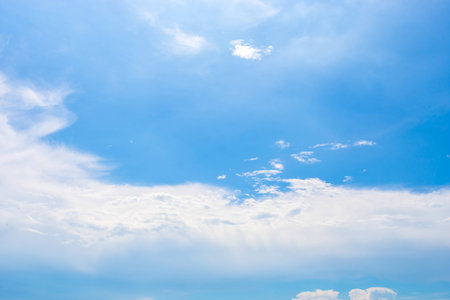 blue sky with white cloudsの写真素材