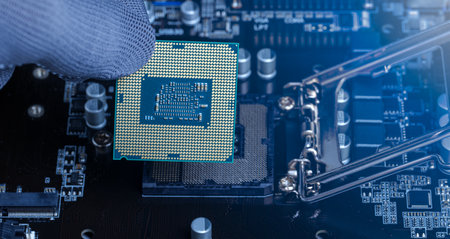 Central Processing Unit (CPU) Replacement by a repairman maintenance, updating the motherboard's hardware, microprocessor chipset, electronic engineering,の写真素材
