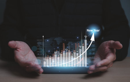 Business finance technology and stock market investment concept. fund and digital Asset, analysing forex trading graph financial data, hologram floating on smartphone between the hands of businessman.の写真素材