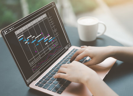 Analyst working with laptop in Business Analytics and Data Management System to make report with KPI...