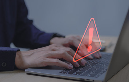 Warning alert system concept, system hacked on computer network, cybercrime and virus, Malicious software, compromised information, illegal connection, data breach cybersecurity vulnerabilityの写真素材