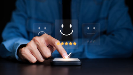 User give rating to service excellent experience on smartphone application, Client evaluate quality of service reputation ranking of business. Customer review satisfaction feedback survey concept.の写真素材