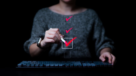 Businesswomen checking mark on checklist with a red checkmark. online checklist survey, filling out...