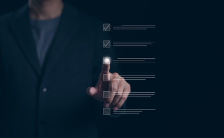 Checklist concept. Businessman using checking marks on online checklist survey. Filling out digital evaluate, list of questionnaire assessments, Exam mark, Internet evaluation, Check mark, Checkbox,の写真素材
