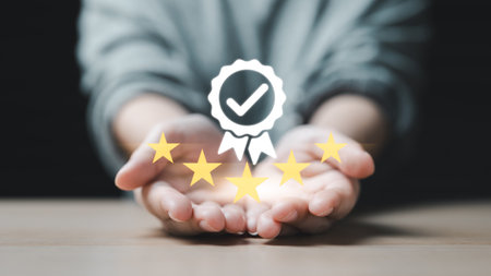 Hand shows the sign of the top service quality assurance 5 star, Guarantee, Standards, ISO...