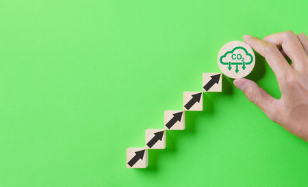 Hand placed CO2 reduction icon with arrow up for decrease CO2. Net zero and carbon neutral, Carbon emissions, CO2 reduce, Sustainable energy, Climate change, Carbon footprint, environmental problem,の写真素材