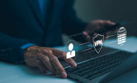 Virtual private network encryption connection concept. Using VPN for secure internet access. A businessman securely accesses the internet through a VPN on his laptop, with a digital interface overlay.の写真素材