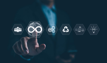 Businessman point at icons representing circular economy concepts such as recycling, renewable energy, sustainable development, future business growth, environmental sustainability, Infinity symbol,の写真素材