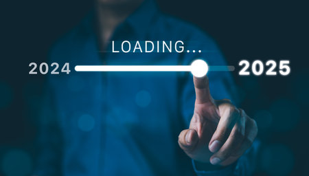 In progress loading year 2024 to 2025, Planning and challenge business strategy in new year, Man hand touching loading bar for countdown to 2025. Countdown merry Christmas and Happy New Year, Startup,の写真素材