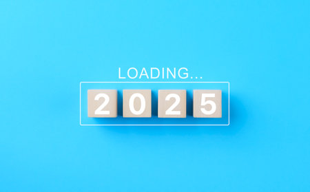 Loading 2025 New Year progress concept. Wooden blocks "2025" with the word "Loading" transition, planning, and preparation for 2025. business strategy, goal setting, new beginnings, future challenges,の写真素材
