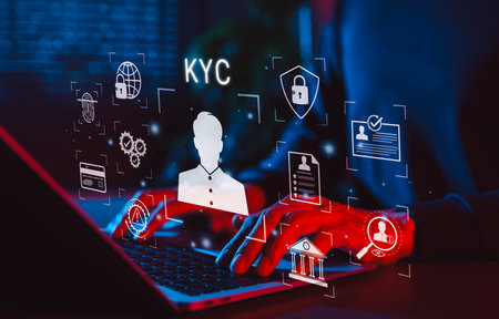 KYC Know Your Customer Identity Verification Concept. User types on laptop with KYC icons, identity verification, biometric authentication, data privacy, customer onboarding in financial technologyの写真素材